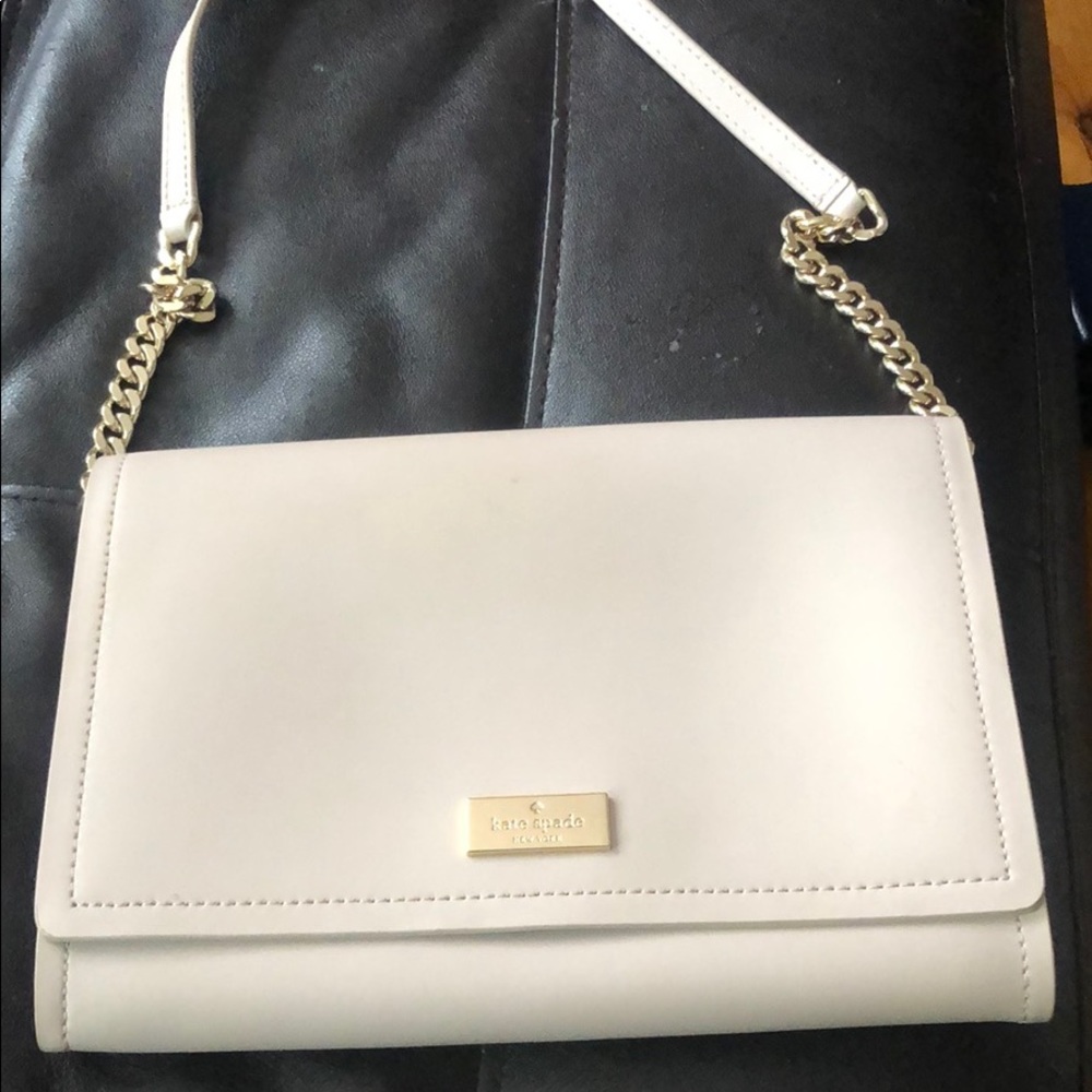 Cream colored Kate Spade envelope purse
